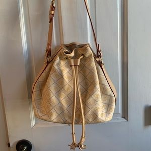 Dooney & Bourke purse.  Pale yellow.  In excellent condition